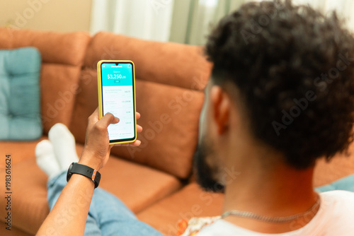 Person checking online banking application on device