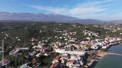 Aerial drone shot.View of famous beach in the summer, Crete, Greece. Famous beach with river and palm trees in Libyan sea. Tropical island, Panoramic view, Most beautiful beaches of Crete island