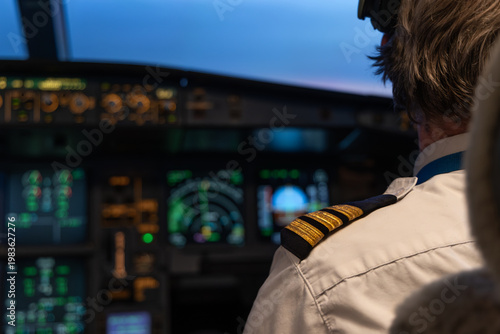 Obraz na płótnie Airplane cockpit with pilot uniform and flight instruments