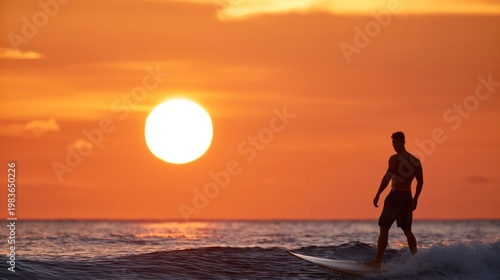 Swimmer Splashes Water on a Sunny Day in the Ocean With Clear Blue Sky