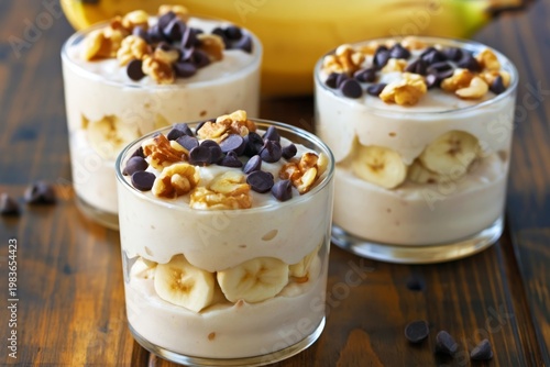 Banana Dessert Served in Clear Glasses With Chocolate Chips and Walnuts on a ...