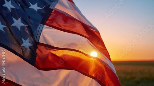 Sunset Behind American Flag With Sun Shining Through Fabric on a Rural Landscape