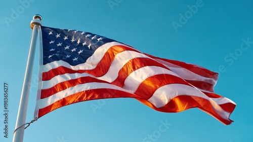 American Flag Waving Against Clear Blue Sky in the Daytime Under Natural Light
