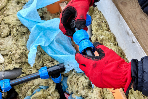 Connection of HDPE pipes using plastic compression fittings.