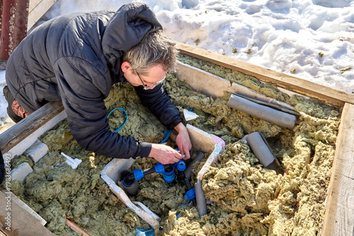 Repair of distribution piping inside artesian well pit.
