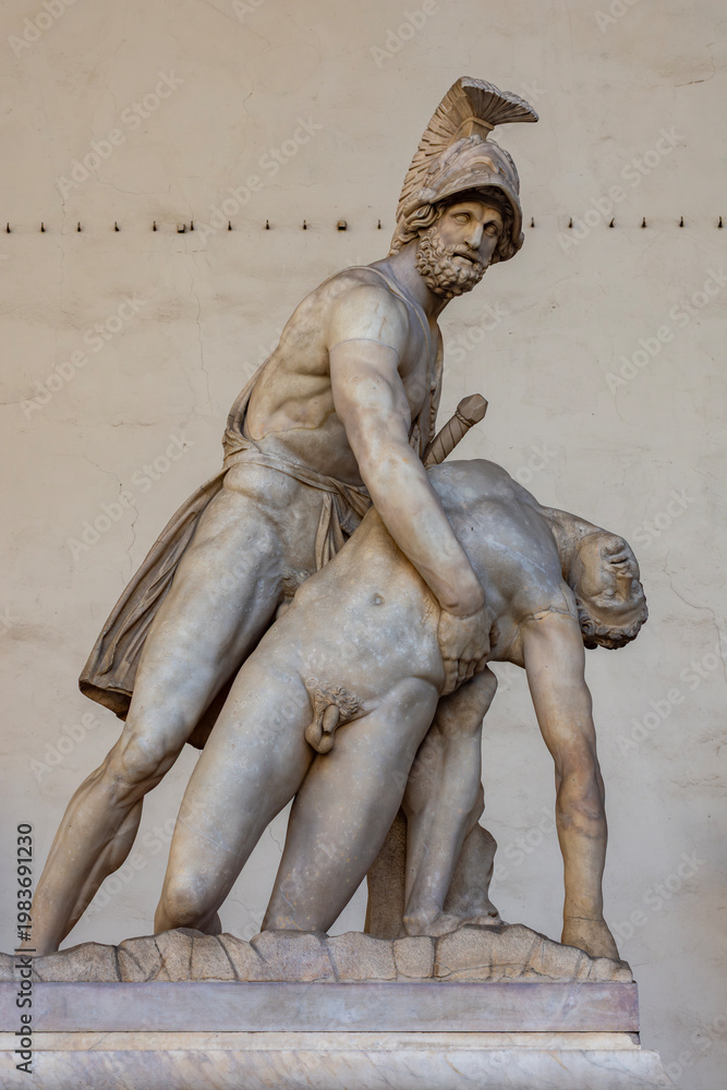 Obraz premium Sculpture of Menelaus supporting body of Patroclus in Loggia dei Lanzi building on Signoria square, Florence, Italy