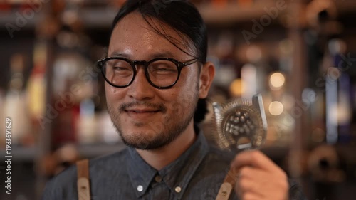 Wallpaper Mural Night club concept of 4k Resolution. Asian male bartender smiling with confidence in liquor store. Torontodigital.ca