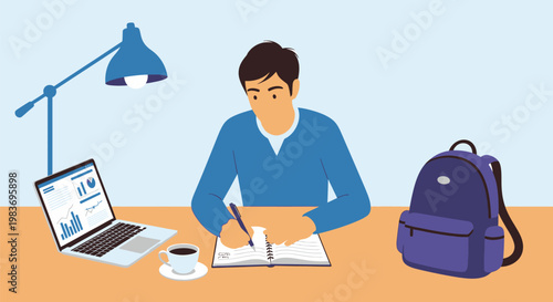 Young man studying with laptop and notebook.