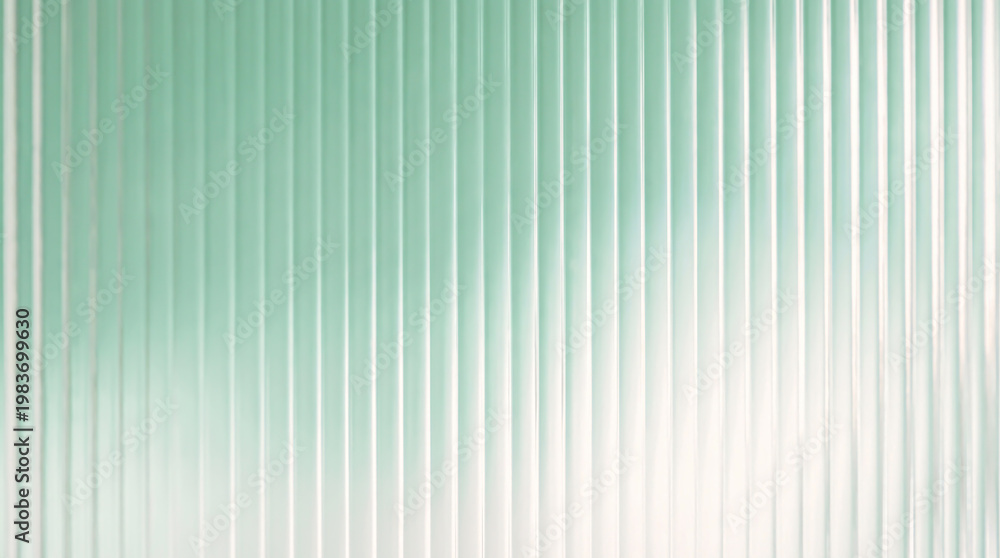 Obraz premium Modern reeded glass texture with vertical lines in a light mint green color. Rippled glass background, bright and diffuse reflection.