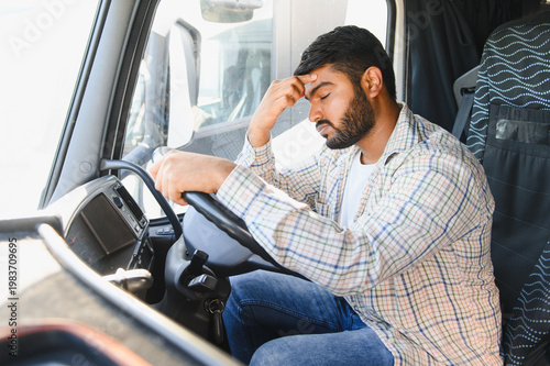 Canvas Print Truck driver experiencing fatigue and stress driving