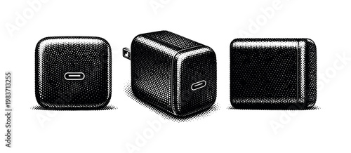 Laptop USB-C charger A compact USB-C laptop charger with block form, rounded edges, and single port opening shown in front, angled, and side views as one