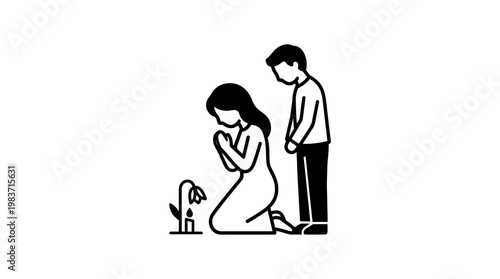 Mourning Couple at Memorial with Wilting Flower