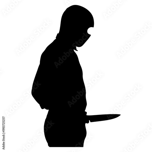Silhouette of a ninja holding a knife.