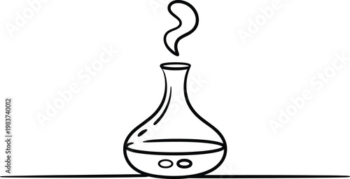 Aromatherapy essential oil diffuser releasing thin wisps of fragrant steam for relaxing home wellness environments