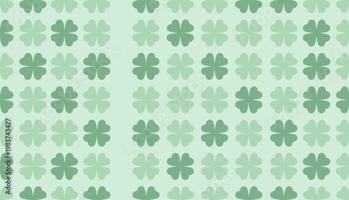 A delightful and charming repeating pattern of four-leaf clovers in varying shades of green, perfect for springtime and St