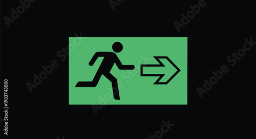 Emergency Exit Direction Sign on Dark Background