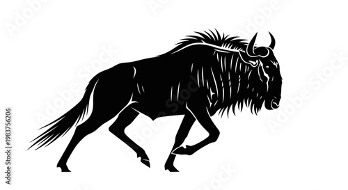 Konstfotografi Black Silhouette of a Wildebeest Running with a Flowing Mane and Horns
