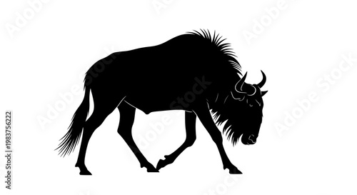 Foto Black Silhouette of a Wildebeest Walking on White Background