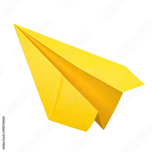 Yellow paper airplane soars in origami style on black background; creative concept symbolizing travel freedom and design element