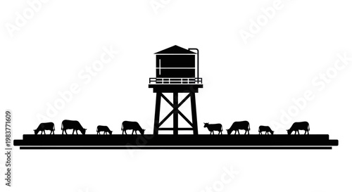 Silhouette of a water tower and grazing cows on a flat plain.
