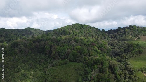 aerial shot, drones flying over a beautiful green mountains in the Cundimarca region in Colombia. Cloudy day 4K