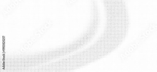 Halftone dots pattern in gray tones on white background with gradient effect
