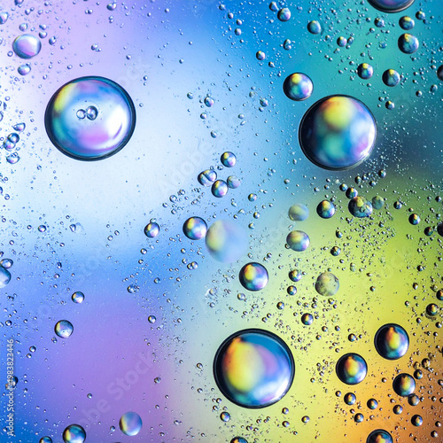 Condensation on colorful reflective surface.