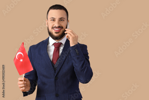 Young male businessman with...
