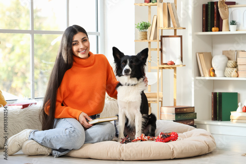 Young woman with book and B...