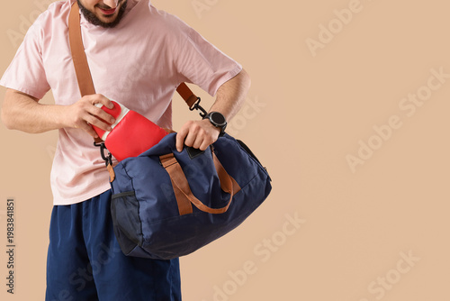 Young man with boxing glove...