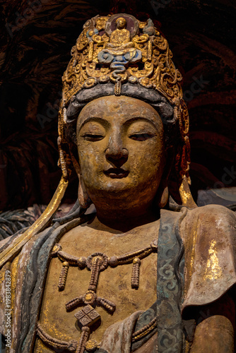 Beautiful stone Buddha statues in ancient Chinese grottoes