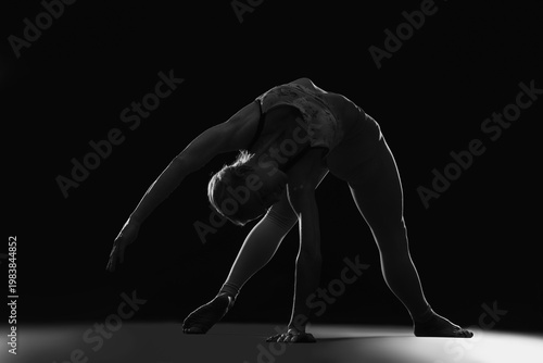 Silhouette of young woman p...