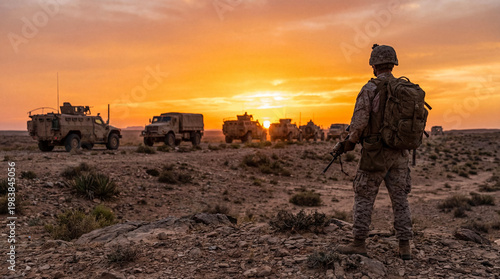 Photos Lone soldier with a backpack standing in a vast, arid desert landscape watching a convoy at a vivid sunset