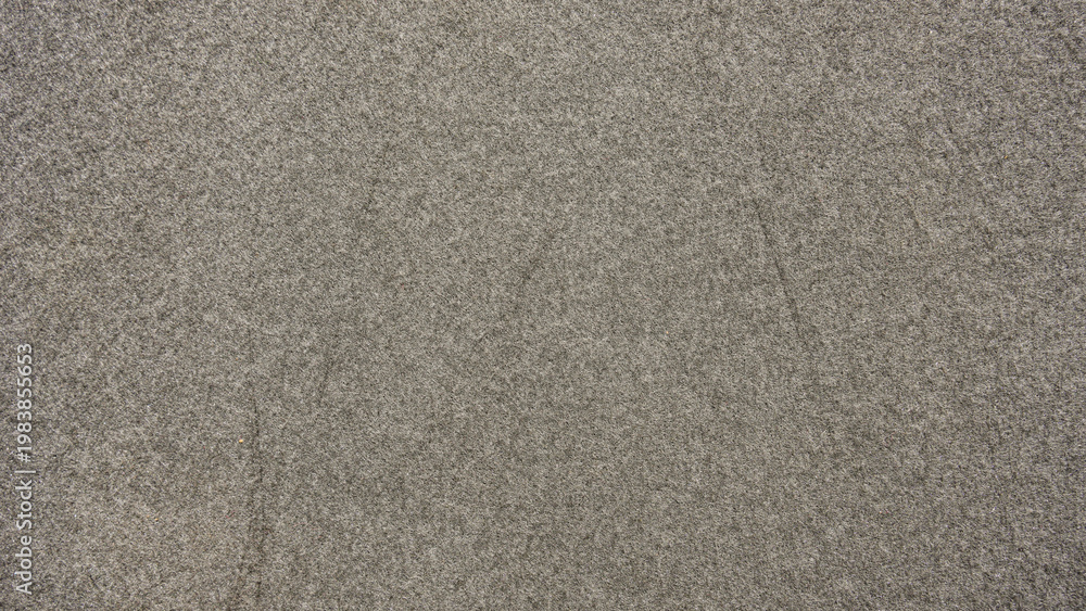 Fototapeta premium A close-up view of a textured gray fabric surface