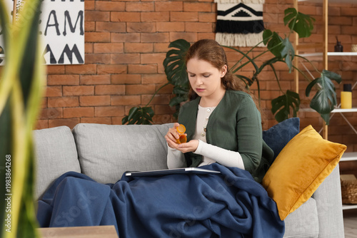 Sick young woman with sore ...