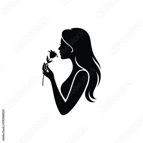Black silhouette of woman smelling flower white background