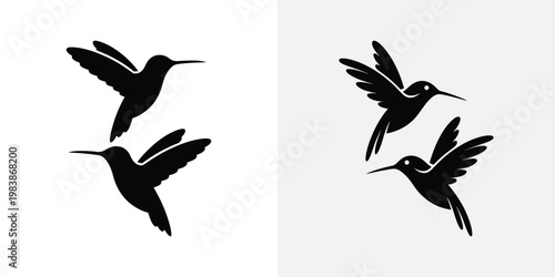 Black silhouettes of hummingbirds in flight flying