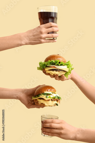 Female hands with tasty bur...