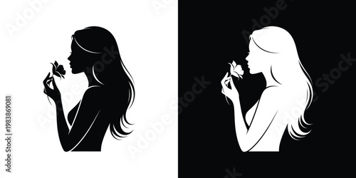 Woman smelling flower silhouette black white