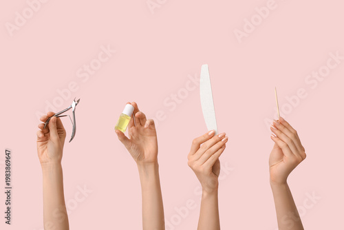 Female hands with bottle of...