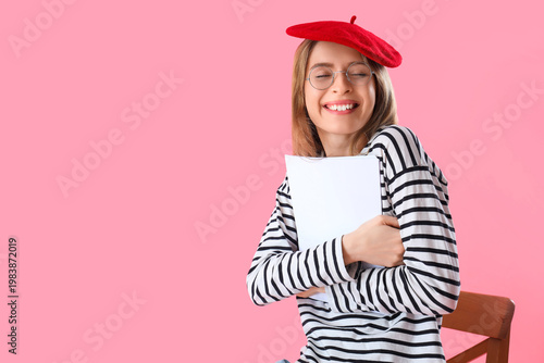 Female author with paper sh...