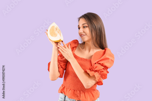 Smiling young woman with po...