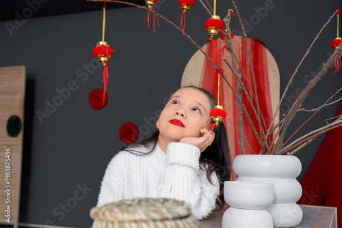 Cute little Asian girl near...