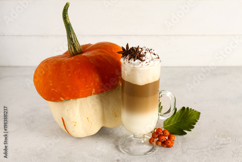 Glass cup of tasty pumpkin ...