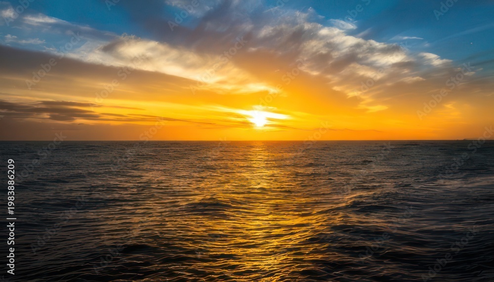 Obraz premium Golden Hour Serenity - A Breathtaking Ocean Sunset with Reflective Waters.