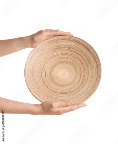 Female hands holding wooden...