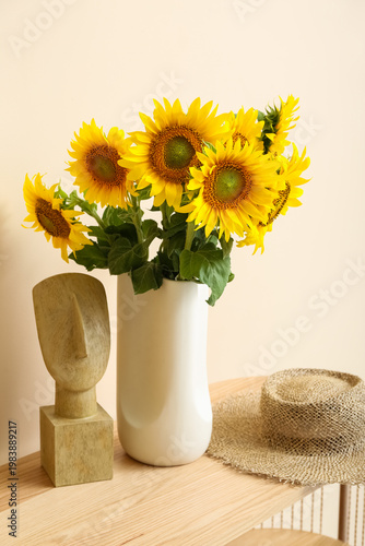Vase with beautiful sunflow...