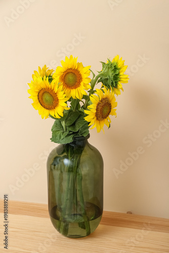 Vase with sunflowers on tab...