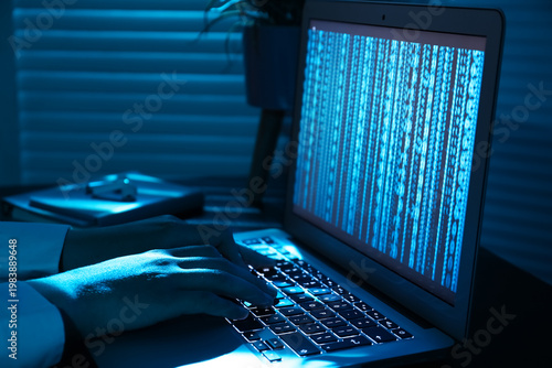Female programmer typing on...