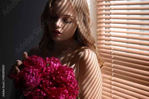 Beautiful young woman with ...